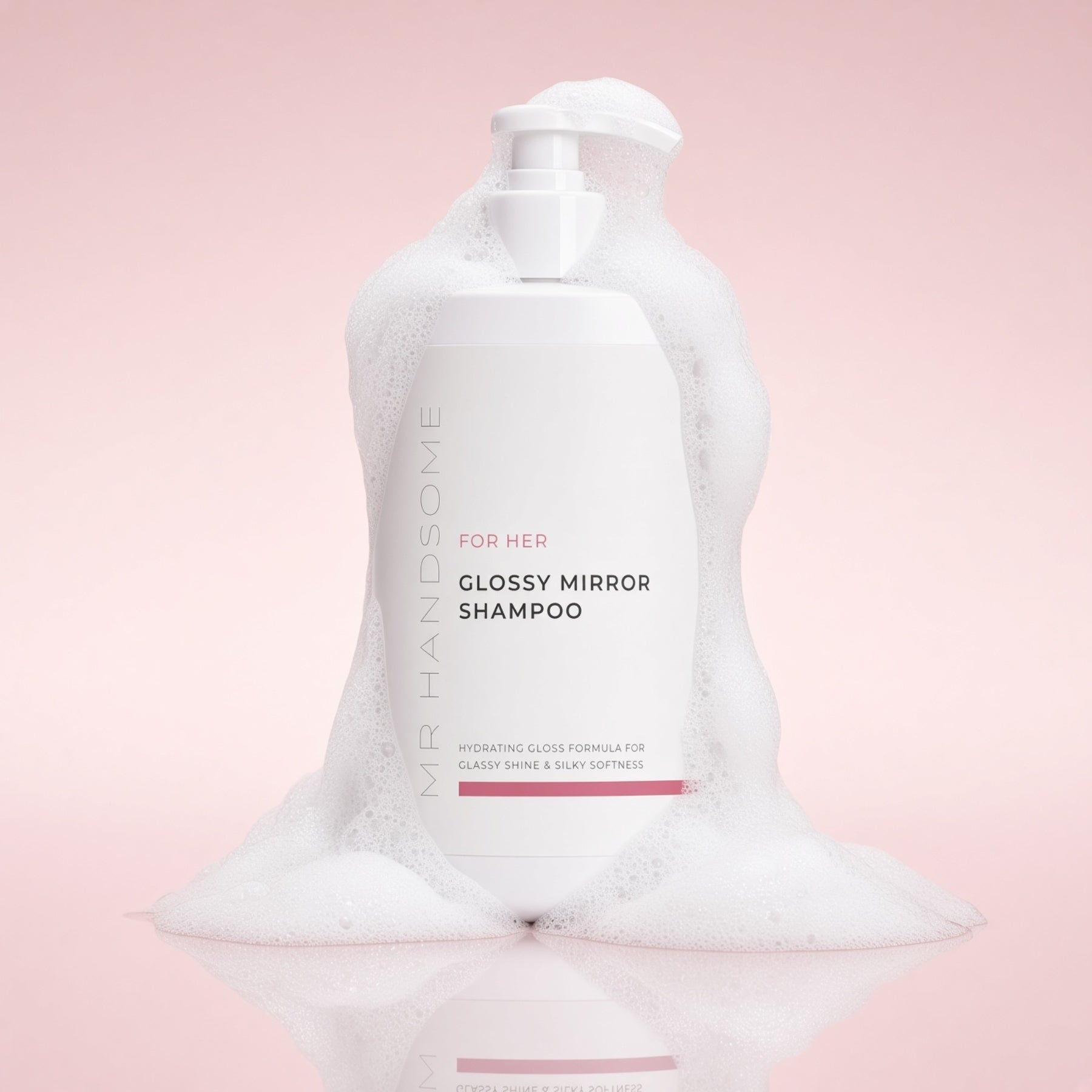 An image of the Glossy Mirror Shampoo with foam on the bottle
